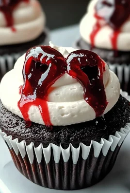 Delicious Halloween Vampire Bite Cupcakes