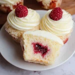 Almond Wedding Cake Cupcakes with Raspberry Filling